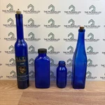 Set Of 4 Cobalt Blue Glass Bottles Vintage Decorative Display Accent. Fixed Price $35.96.